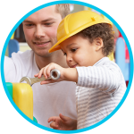 Daycare provider and child constructing together